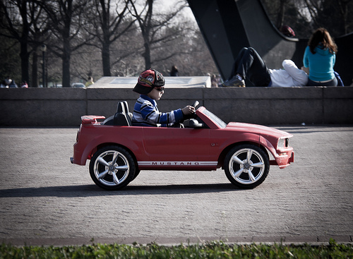 Kid in Toy Electric Car - Flushing Meadows Corona Park - Queens, NYC